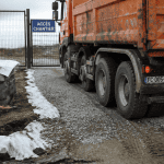 acces chantier gravier geotextile camion